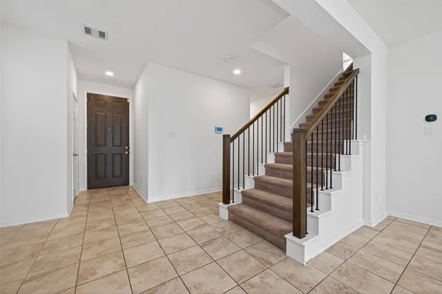 a view of a hallway with entryway