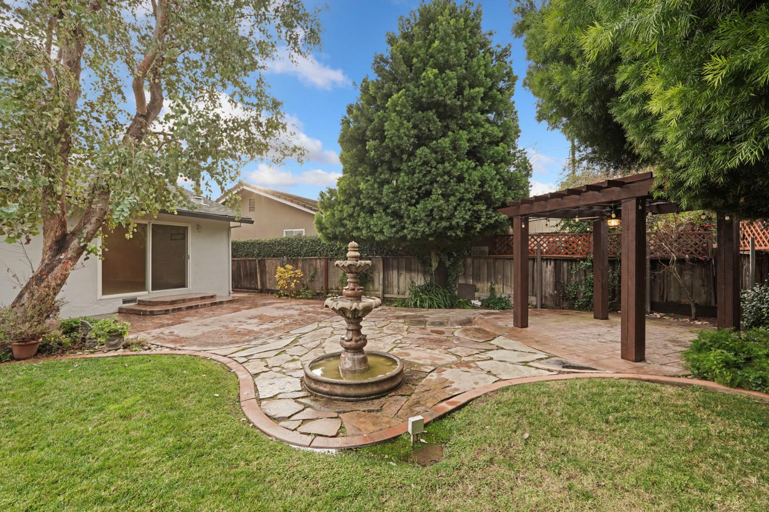 1007 Cardinal Street Lodi, CA 95240 - Photo 28 of 31 a front view of house with yard and outdoor seating