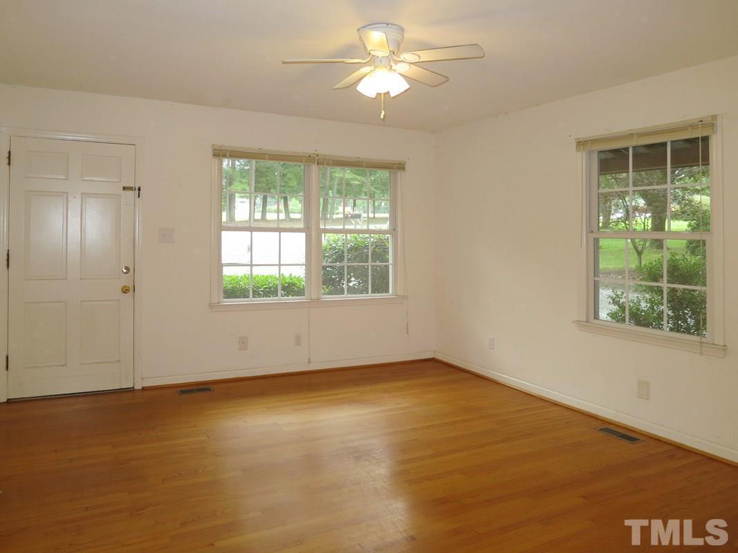 312 Davie Road Carrboro, NC 27510 - Photo 3 of 14 a view of an empty room with a window