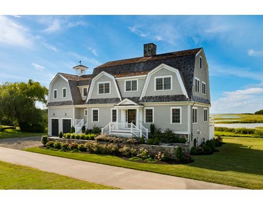25 Bayberry Road Scituate, MA 02066 - Photo 1 of 28 a front view of a house with a yard