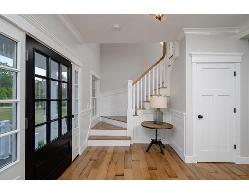 25 Bayberry Road Scituate, MA 02066 - Photo 15 of 28 a view of an entryway with wooden floor and door
