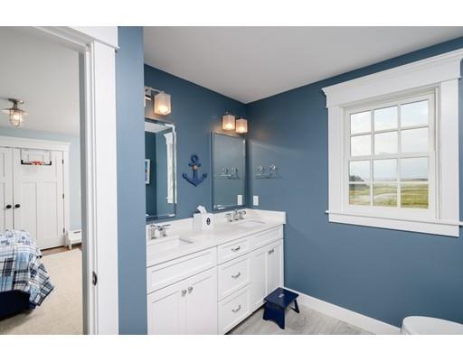 25 Bayberry Road Scituate, MA 02066 - Photo 20 of 28 a bathroom with a sink vanity granite tub and a mirror