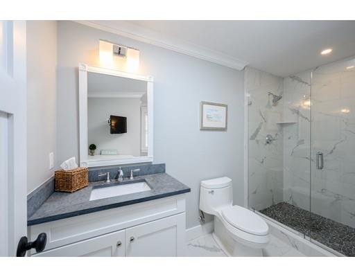 25 Bayberry Road Scituate, MA 02066 - Photo 23 of 28 a bathroom with a sink a toilet and shower
