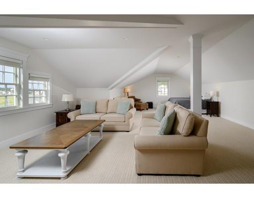 25 Bayberry Road Scituate, MA 02066 - Photo 24 of 28 a living room with furniture and a couch