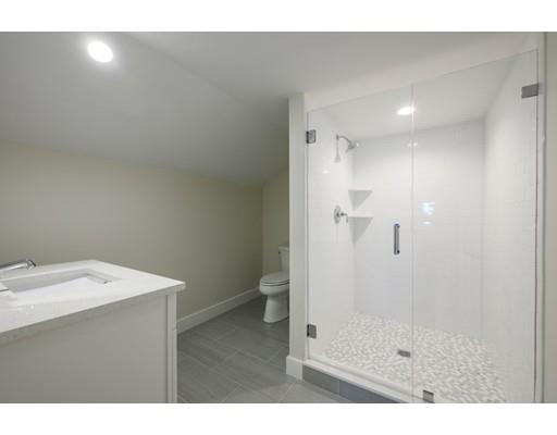 25 Bayberry Road Scituate, MA 02066 - Photo 25 of 28 a bathroom with a sink and a mirror