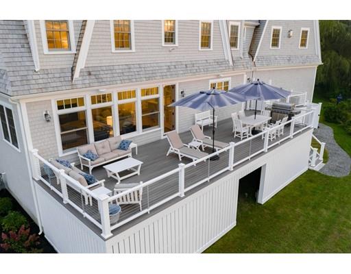 25 Bayberry Road Scituate, MA 02066 - Photo 3 of 28 a view of a large building with a yard