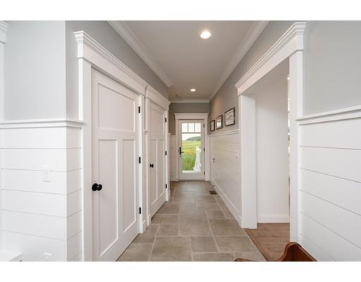 25 Bayberry Road Scituate, MA 02066 - Photo 6 of 28 a view of a hallway with wooden floor