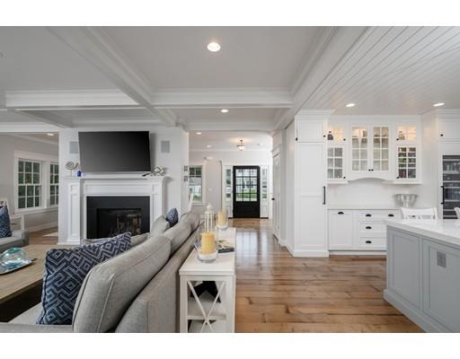 25 Bayberry Road Scituate, MA 02066 - Photo 10 of 28 a living room with furniture and a fireplace