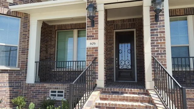 a front view of a house with a door