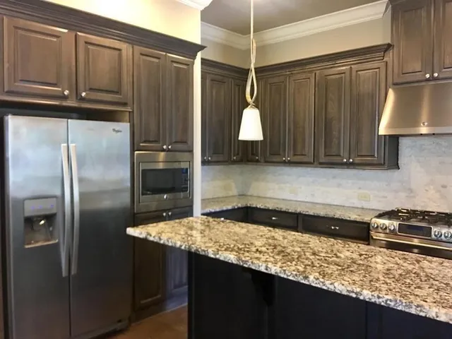 a view of a livingroom with wooden floor