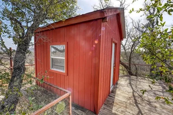 a view of a house with a small cabin