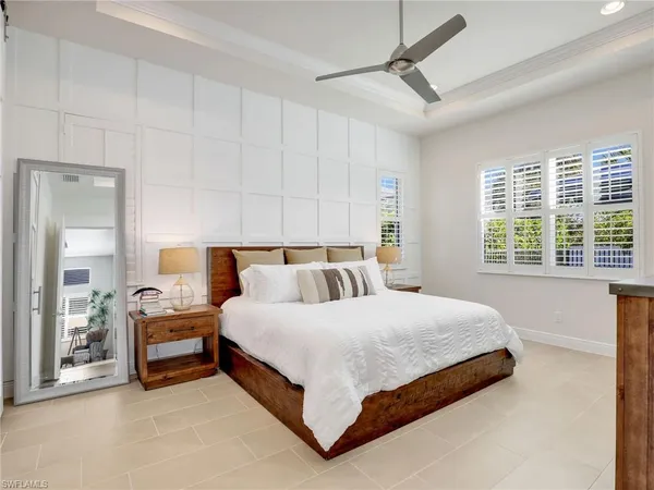 a bedroom with a bed and furniture