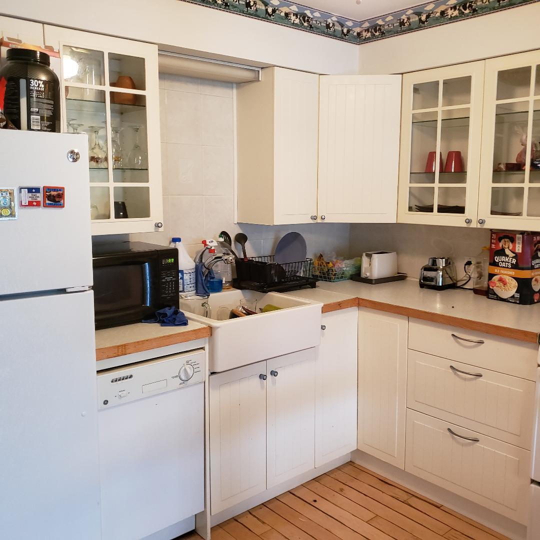 912 South Plum Grove Road, Unit 122 Palatine, IL 60067 - Photo 11 of 18 a kitchen with a cabinets and window