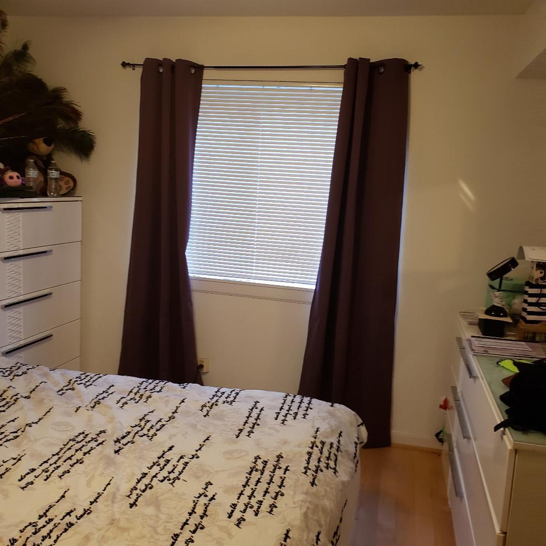 912 South Plum Grove Road, Unit 122 Palatine, IL 60067 - Photo 12 of 18 a bedroom with a bed and a dresser