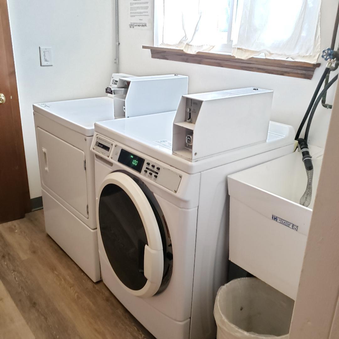 912 South Plum Grove Road, Unit 122 Palatine, IL 60067 - Photo 17 of 18 a utility room with dryer and washer