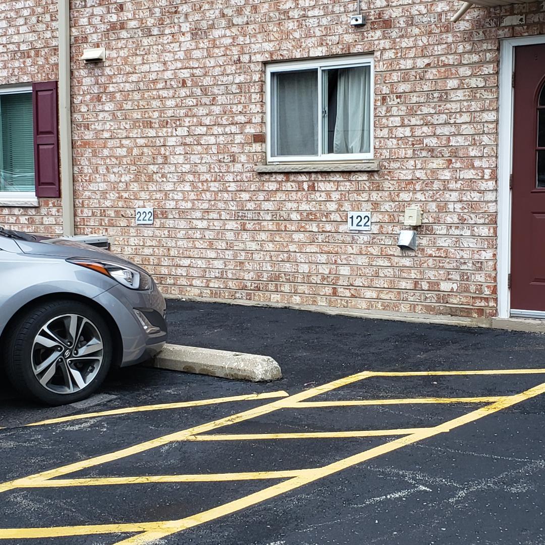 912 South Plum Grove Road, Unit 122 Palatine, IL 60067 - Photo 6 of 18 a view of that has a car parked in it