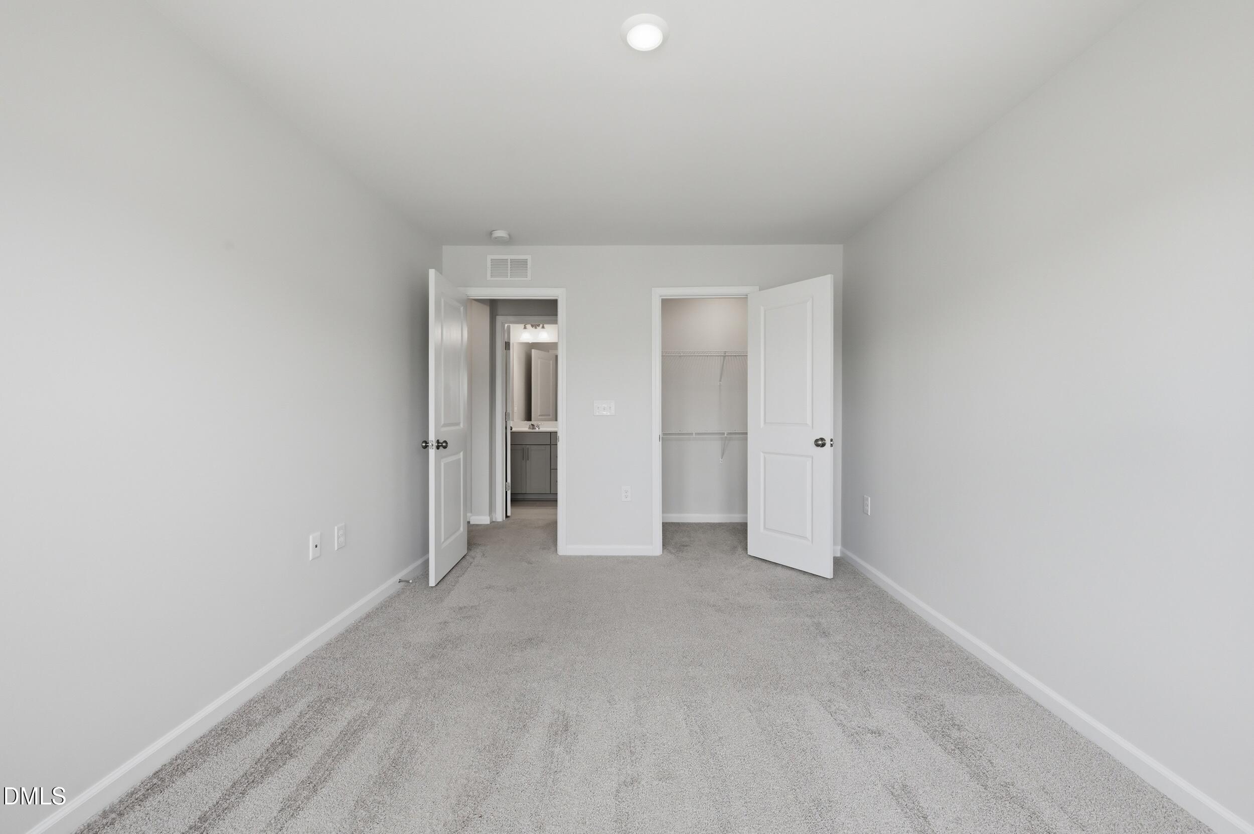 5011 Kota Street Raleigh, NC 27610 - Photo 24 of 42 a view of an empty room and closet area
