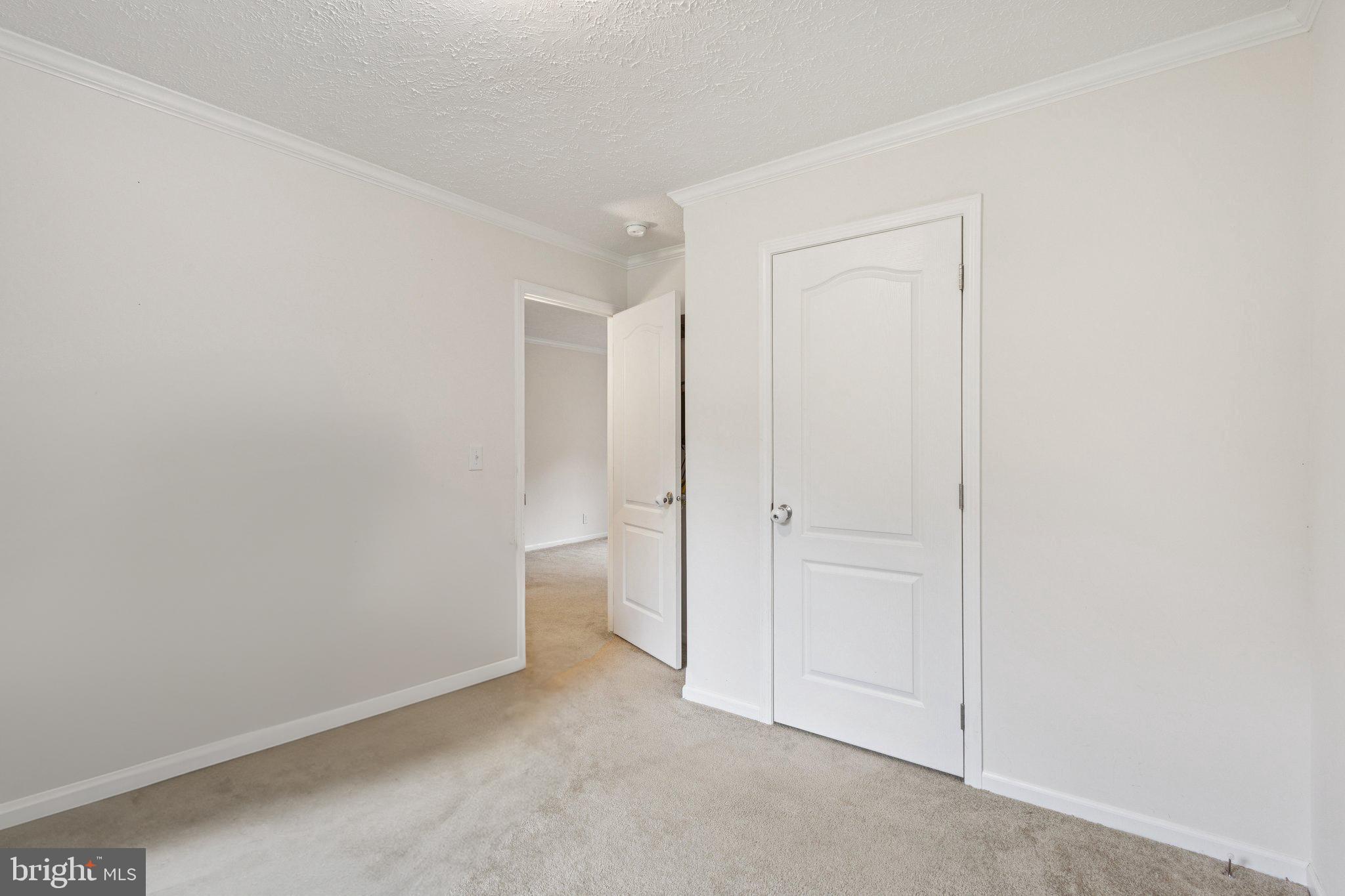 13153 Stonehouse Mountain Road Culpeper, VA 22701 - Photo 25 of 45 a view of an empty room