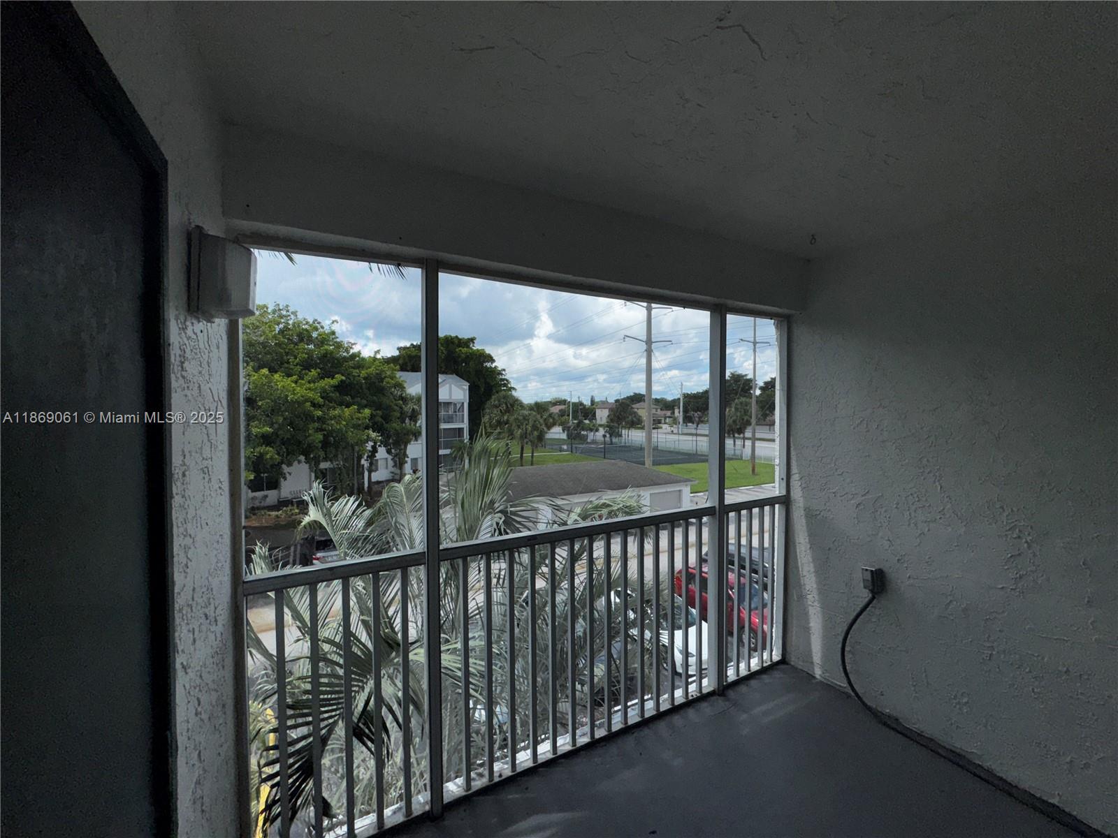 5780 Rock Island Road, Unit 375 Tamarac, FL 33319 - Photo 18 of 26 a view of a city from a balcony