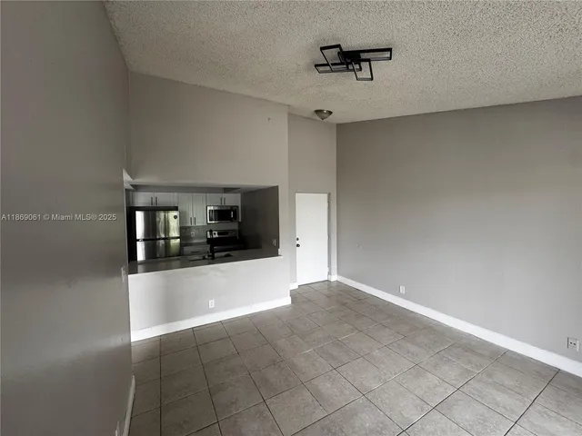 a view of a living room hardwood and furniture