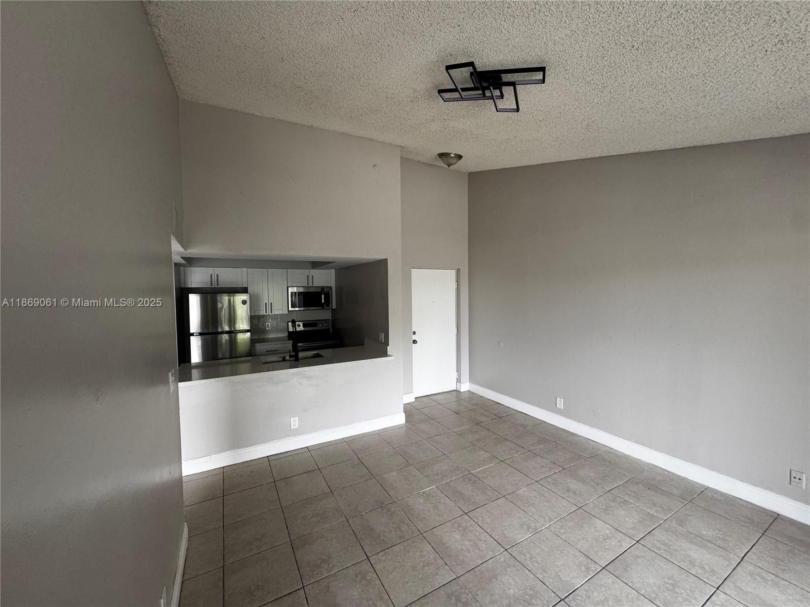 5780 Rock Island Road, Unit 375 Tamarac, FL 33319 - Photo 8 of 26 a view of a living room hardwood and furniture