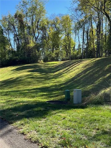 a view of a golf course with a lake