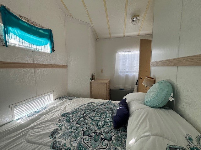 2795 East 28th Road Marseilles, IL 61341 - Photo 13 of 64 a bedroom with a bed and a window