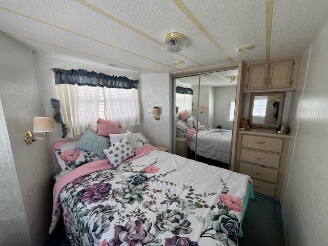 2795 East 28th Road Marseilles, IL 61341 - Photo 15 of 64 a bedroom with a large bed and a dresser