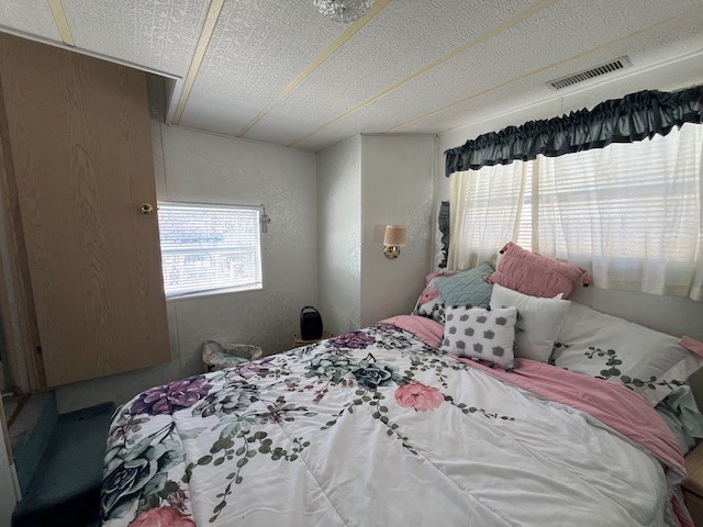2795 East 28th Road Marseilles, IL 61341 - Photo 18 of 64 a bedroom with a bed and window