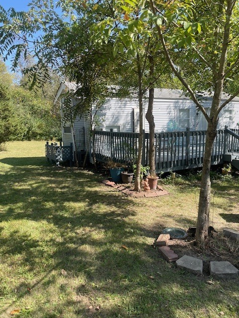 2795 East 28th Road Marseilles, IL 61341 - Photo 24 of 64 a view of a bench in a backyard