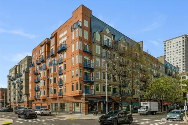 a view of a building with a street