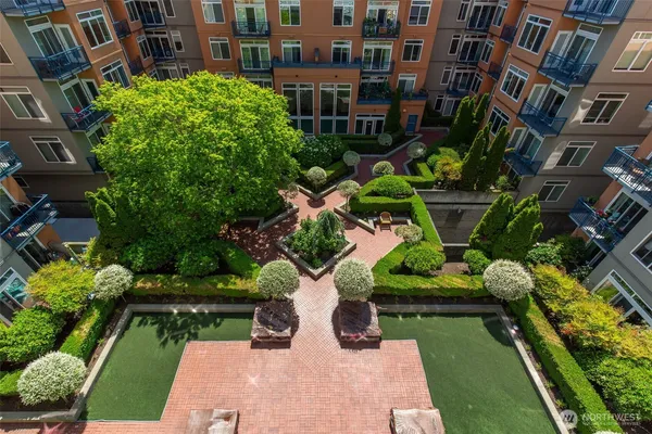 a view of swimming pool with outdoor seating