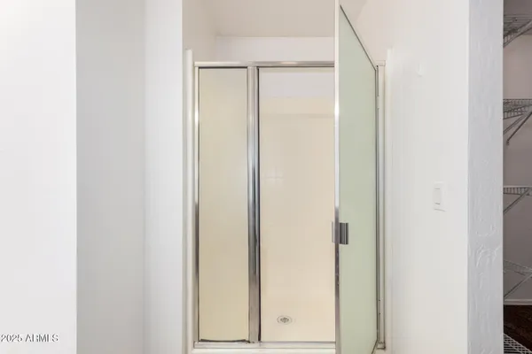a view of a room with racks on the wall