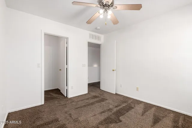 a view of small space with racks on the wall