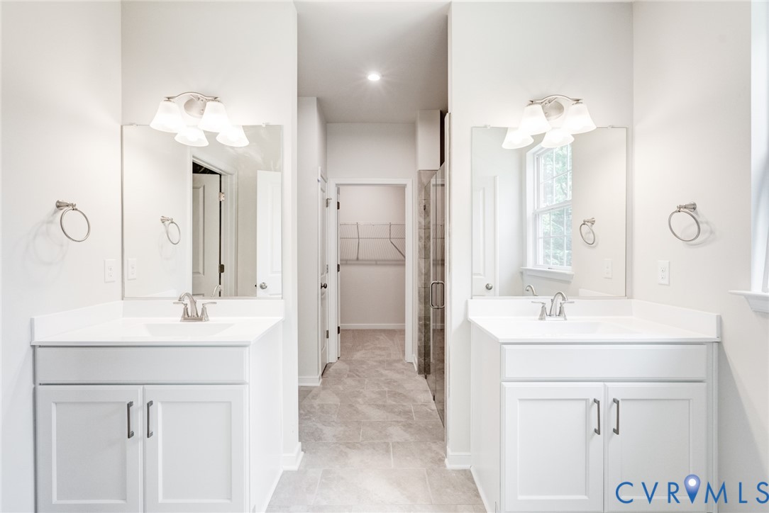 0 Canoe Pointe Loop Moseley, VA 23120 - Photo 7 of 15 a bathroom with a sink vanity and a mirror