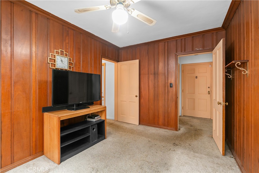 1615 North Van Ness Avenue Compton, CA 90221 - Photo 11 of 36 a view of room with furniture and flat screen tv