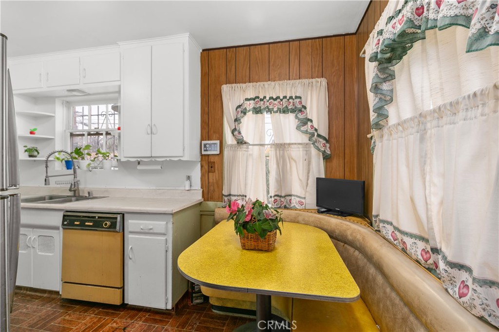 1615 North Van Ness Avenue Compton, CA 90221 - Photo 22 of 36 a kitchen with a sink and a stove top oven