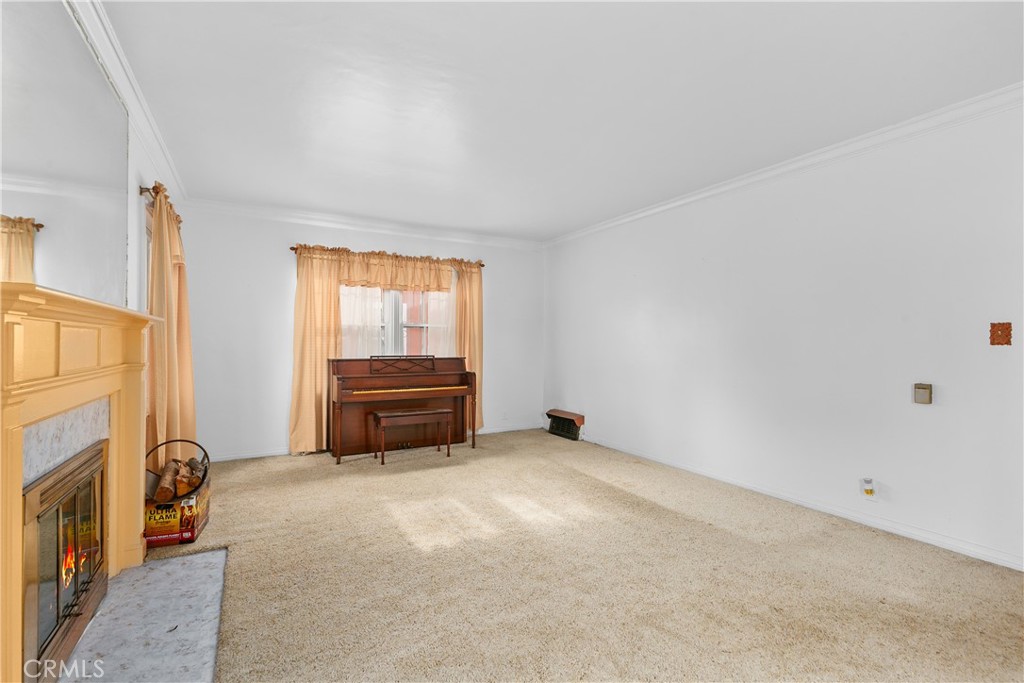 1615 North Van Ness Avenue Compton, CA 90221 - Photo 7 of 36 a view of livingroom with washer and dryer