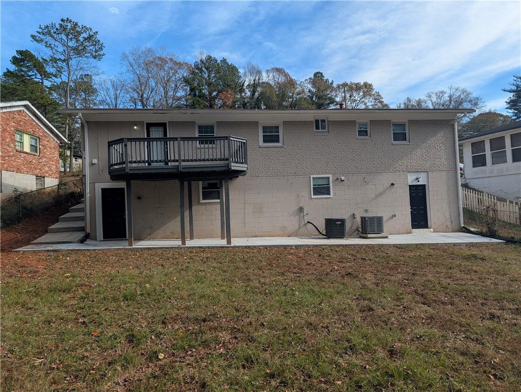 2435 Bouldercliff Way Southeast, Unit B Atlanta, GA 30316 - Photo 1 of 1 a front view of a house with a yard
