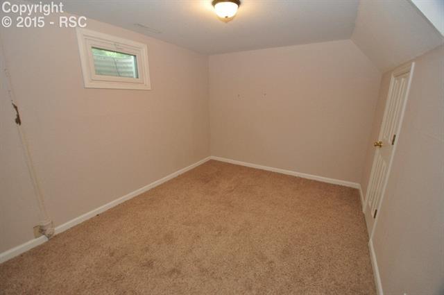 6 South Chelton Road Colorado Springs, CO 80910 - Photo 11 of 16 Bedroom 4 - basement