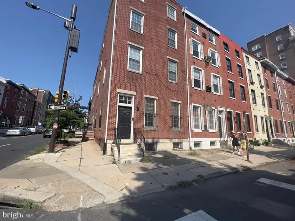 a view of a building with a street