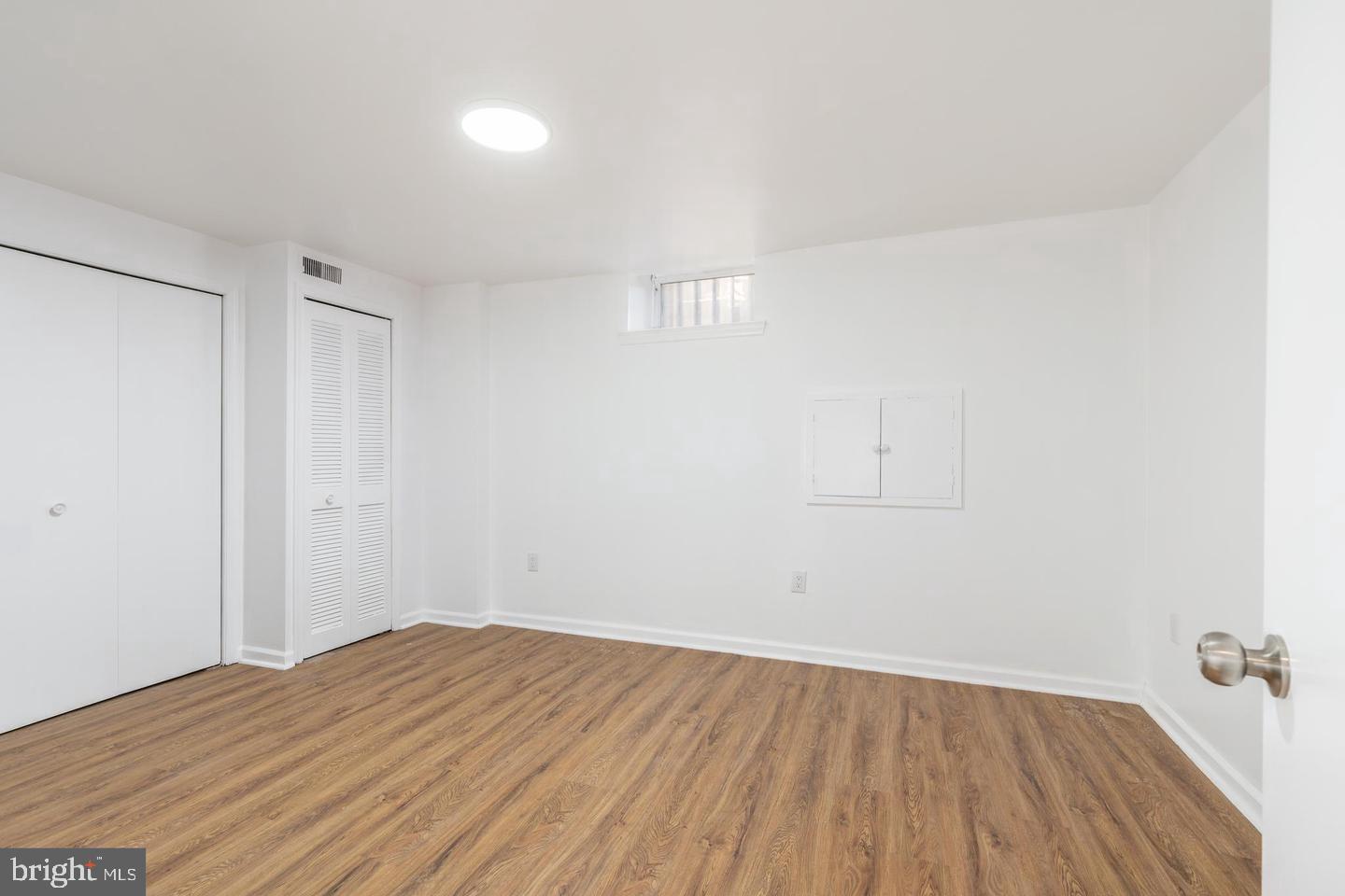 422 South 15th Street, Unit 1 Philadelphia, PA 19146 - Photo 15 of 19 a view of a room with wooden floor