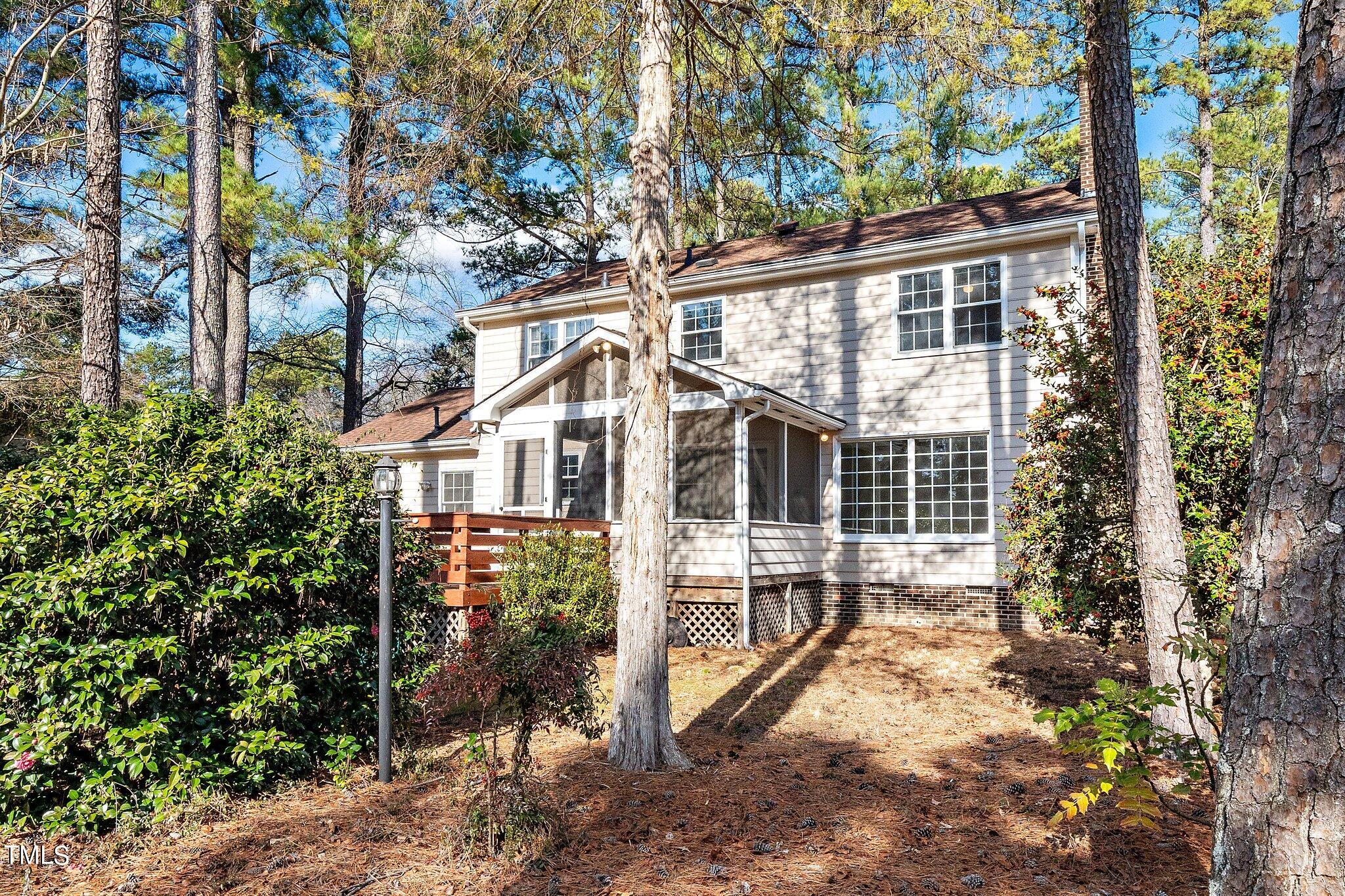 5705 Timber Ridge Drive Raleigh, NC 27609 - Photo 30 of 31 front view of a house with a yard