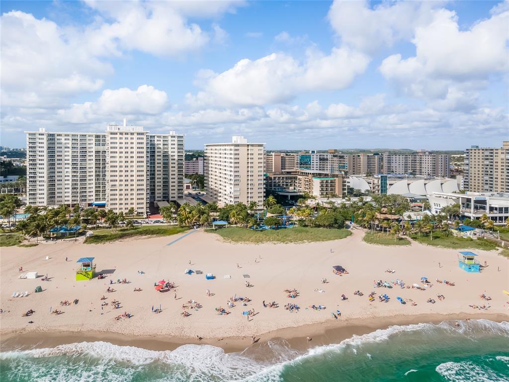 133 North Pompano Beach Boulevard, Unit 911 Pompano Beach, FL 33062 - Photo 20 of 21 a view of swimming pool with a garden