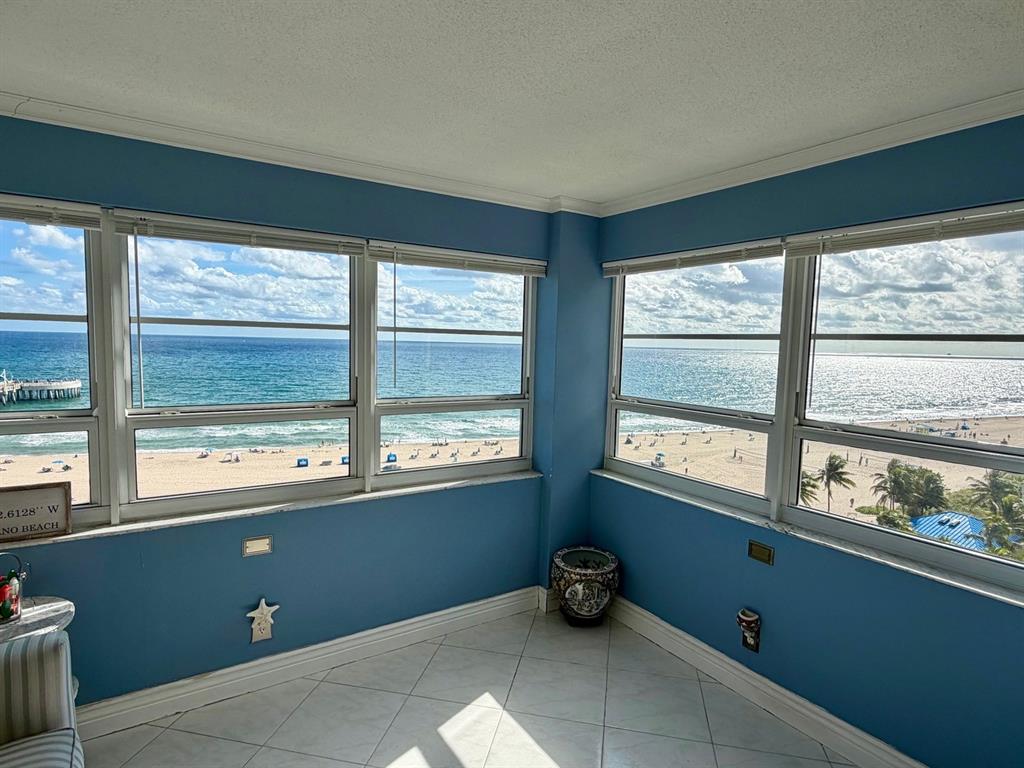 133 North Pompano Beach Boulevard, Unit 911 Pompano Beach, FL 33062 - Photo 6 of 21 a room with furniture and windows