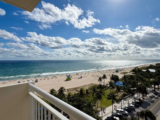 a view of a yard with an ocean view