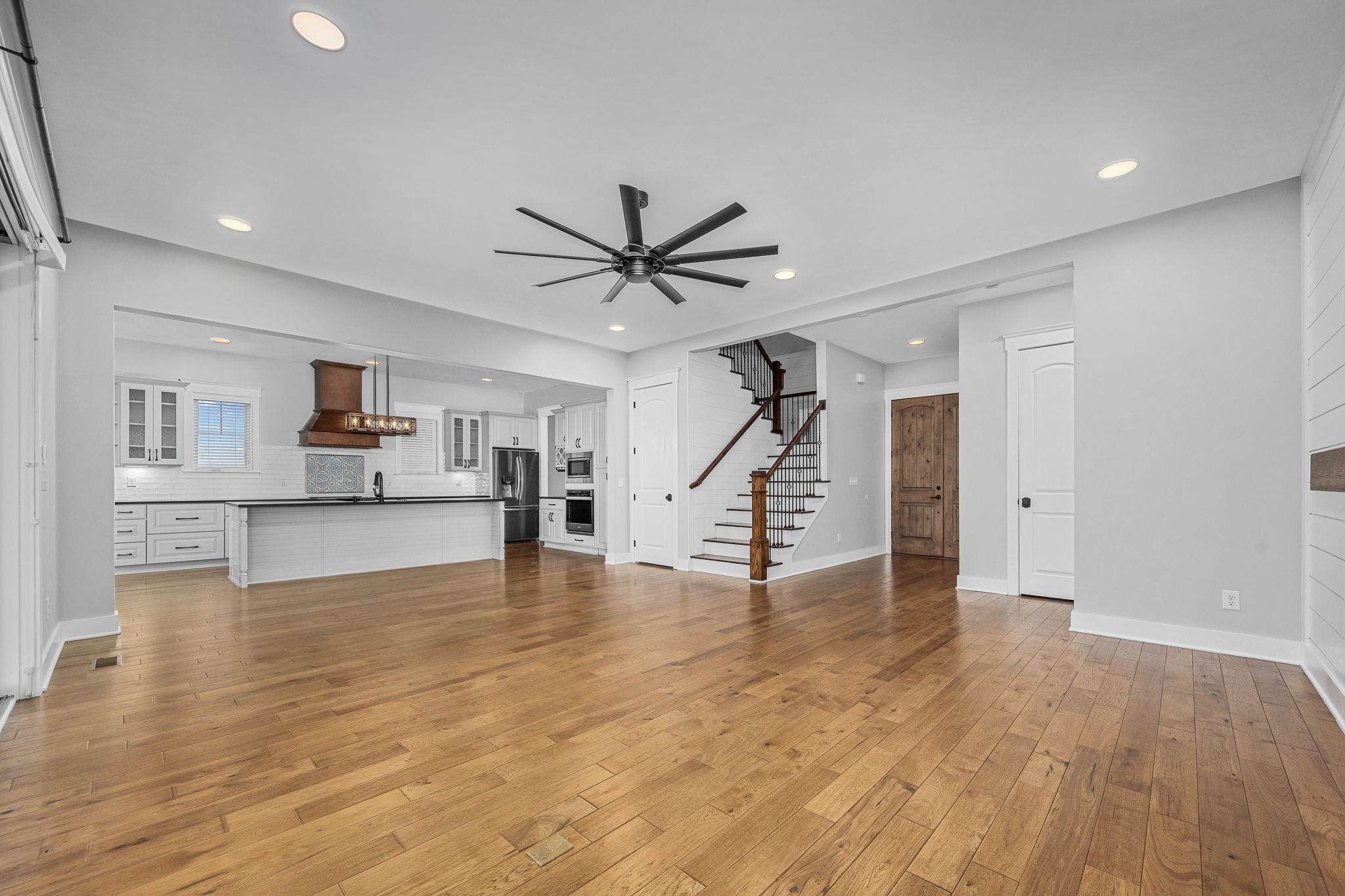 5296 Cross Plains Road White House, TN 37188 - Photo 11 of 87 a view of empty room with wooden floor and ceiling fan