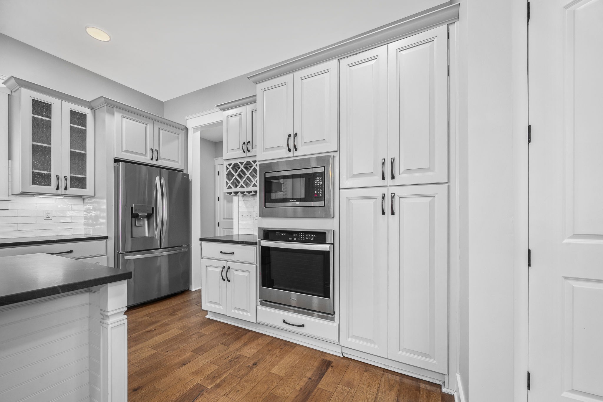 5296 Cross Plains Road White House, TN 37188 - Photo 18 of 87 a kitchen with stainless steel appliances granite countertop a refrigerator and a stove top oven