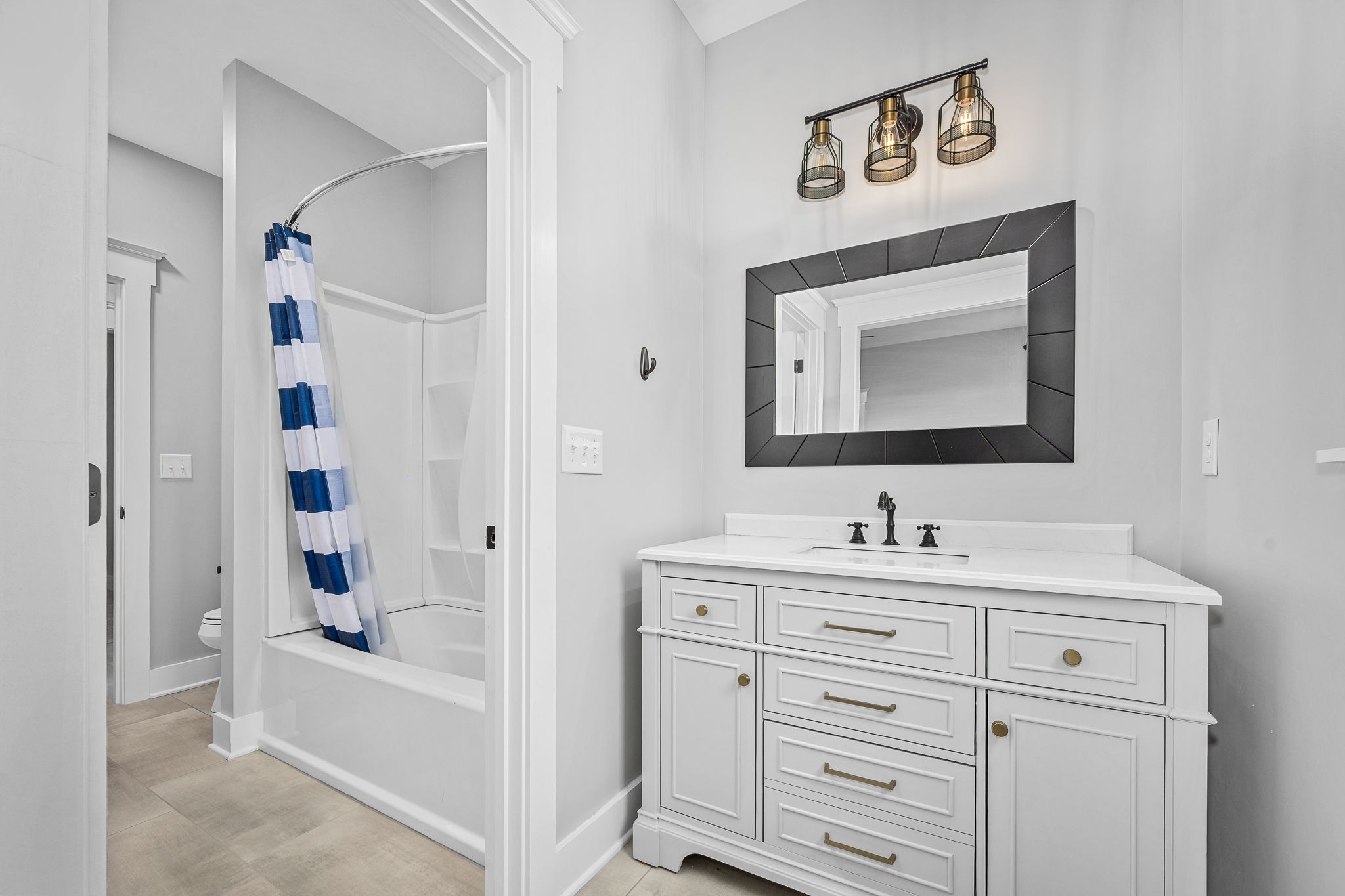 5296 Cross Plains Road White House, TN 37188 - Photo 46 of 87 a bathroom with a bathtub sink vanity and mirror