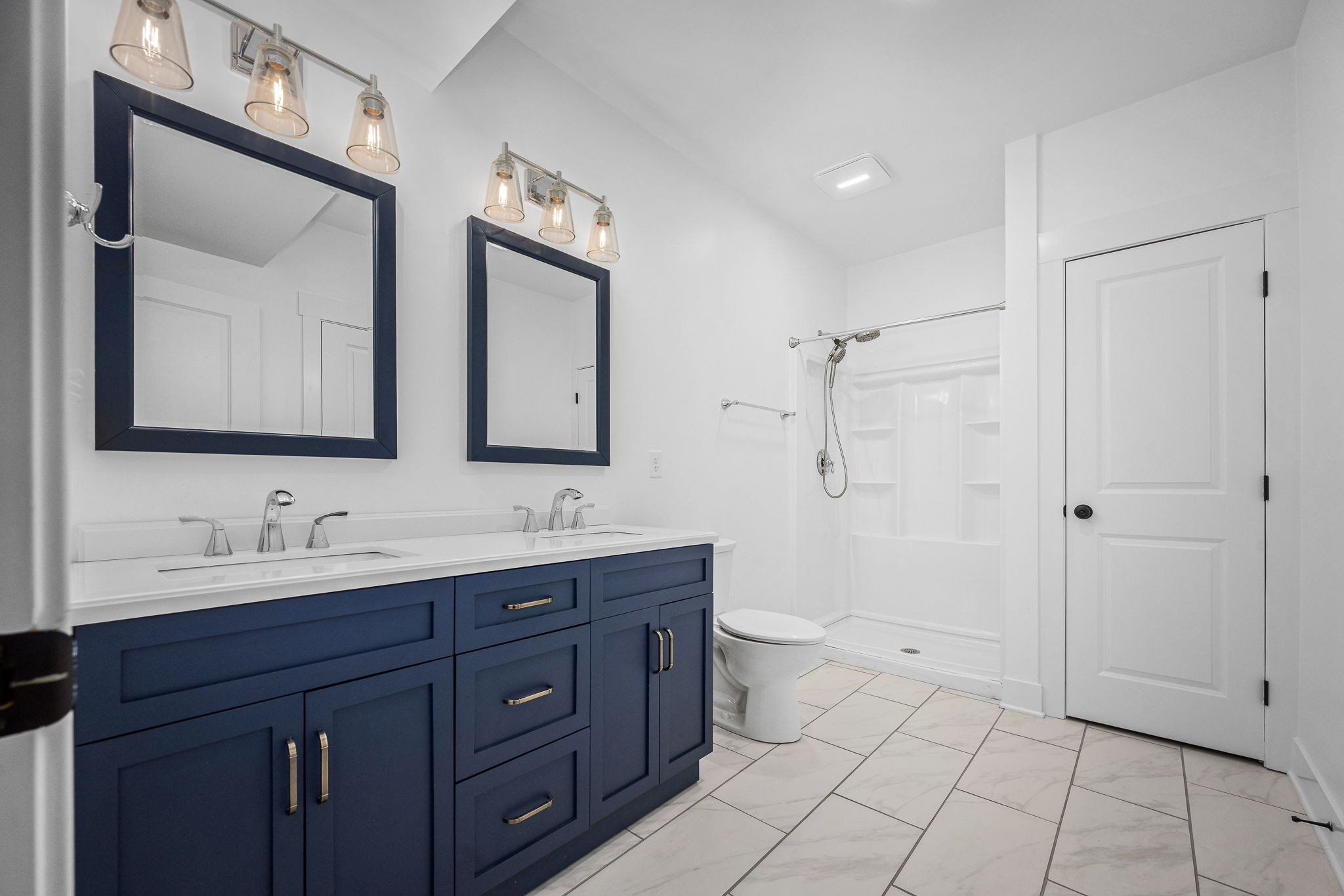 5296 Cross Plains Road White House, TN 37188 - Photo 61 of 87 a bathroom with a double vanity sink mirror and